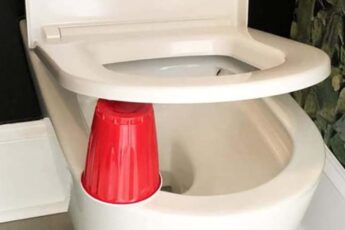 Why People Are Placing A Red Cup Under Their Toilet Seat At Night (And Why You Should Too)